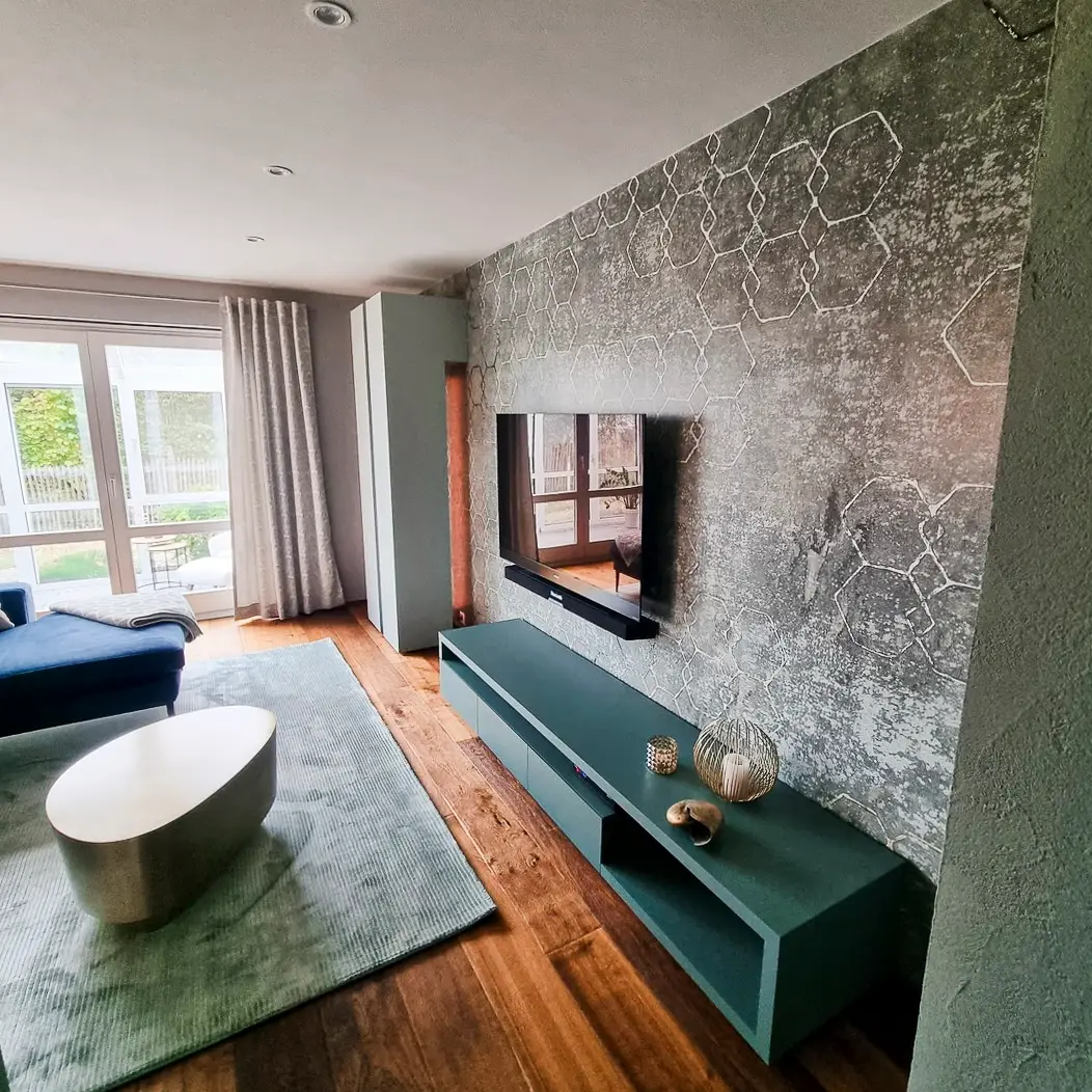 Referenz Einrichtung Projekt Wohnzimmer Nicole Hafen, grüne Optik eines Wohnzimmers, Interior Designerin Bodensee